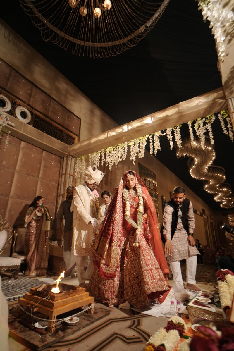 Elegant Indian wedding ceremony with bride and groom in Jaipur, India.